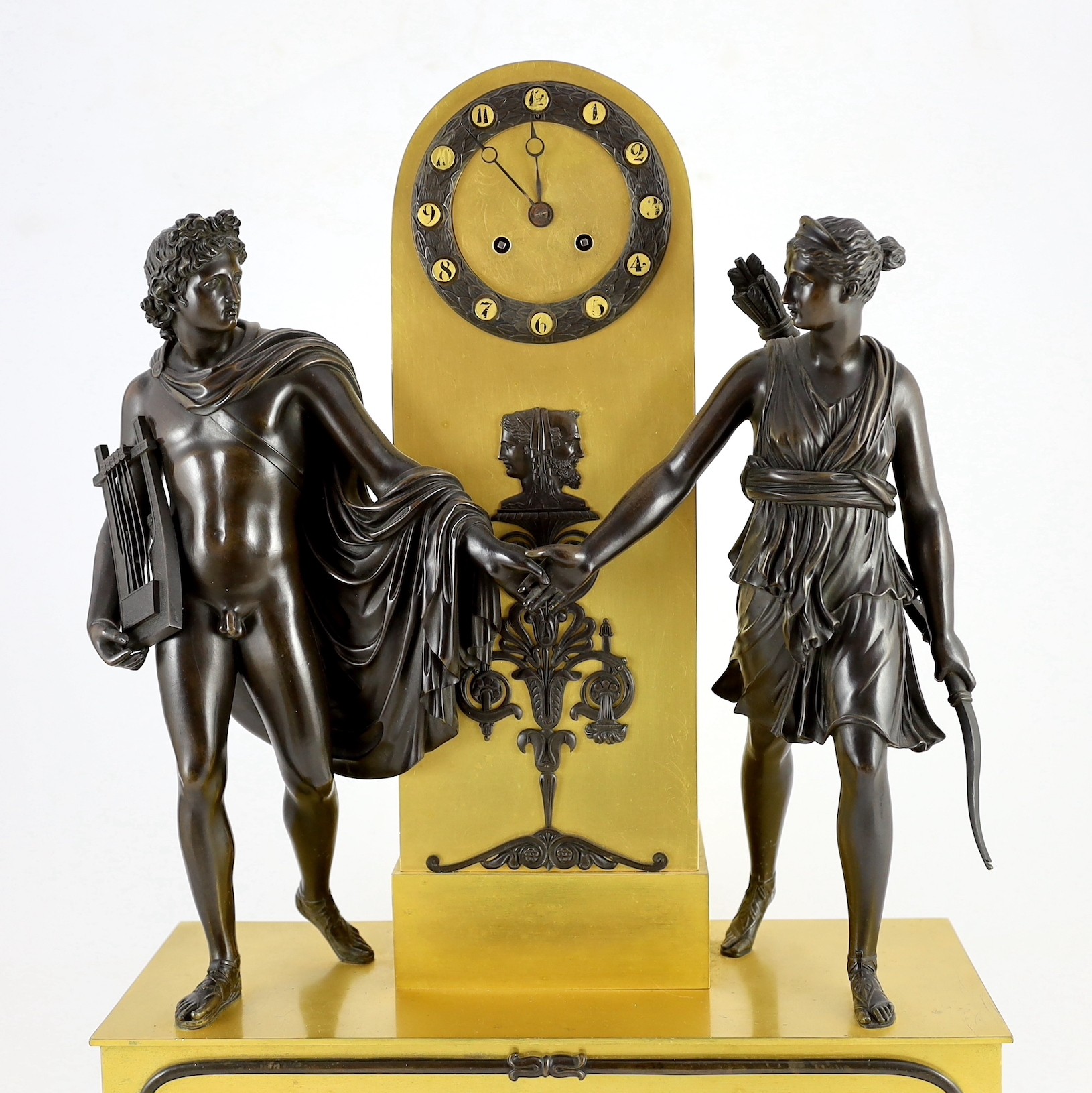 A 19th century French Louis XVI style bronze and ormolu mantel clock, width 42cm height 60cm
